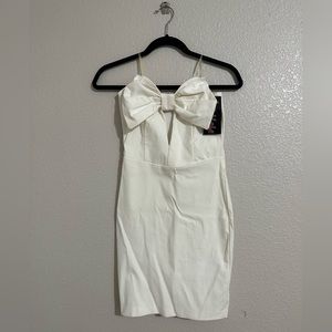 Off white strapless dress with bow.